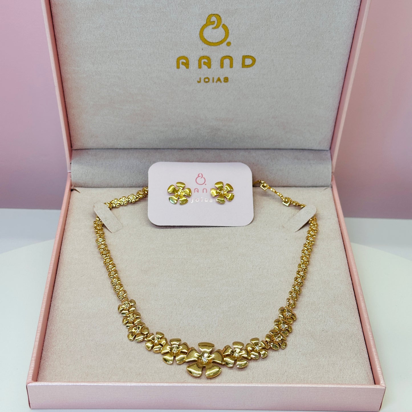 Conjunto Brinco e colar  Florzinhas dourado com regulagem